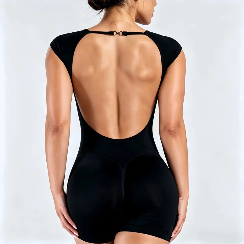 Short-sleeve seamless bodysuit in black, open back, worn