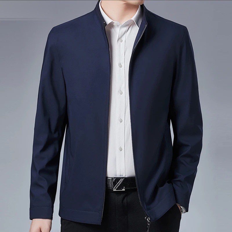 Business zip jacket in navy, stand collar, worn open over a shirt